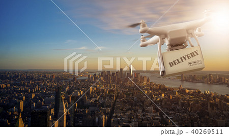 Drone flying with package over Manhattan Drone flying with package over Manhattan 40269511