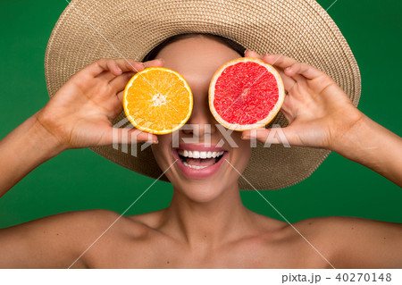 Glad girl with fruit instead of eyeballs Glad girl with fruit instead of eyeballs 40270148