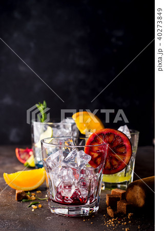 glasses of spritz aperitif aperol cocktail with orange slices and ice cubes glasses of spritz aperitif aperol cocktail with orange slices and ice cubes 40273849