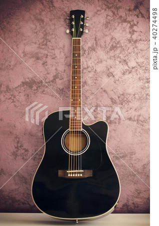 black acoustic guitar black acoustic guitar 40274498