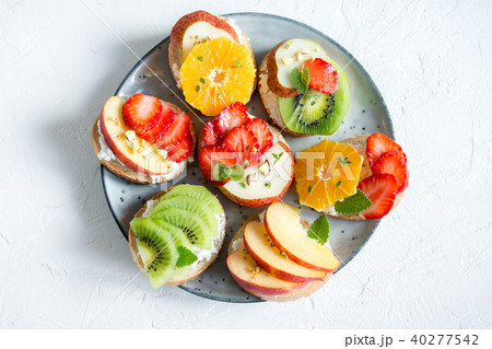 Fruit dessert sandwiches with ricotta cheese 40277542