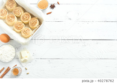 Cinnamon rolls and ingredients Cinnamon rolls and ingredients 40278762