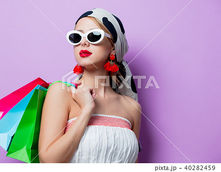 Woman with shopping bags Woman with shopping bags 40282459