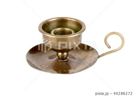 Brass vintage candlestick on white 40286272