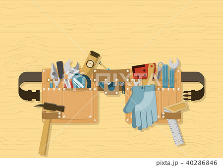 Tool belt on wood background Tool belt on wood background 40286846