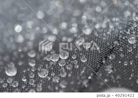 Closeup detailed view of raindrops on a fabric, a background. 40291422