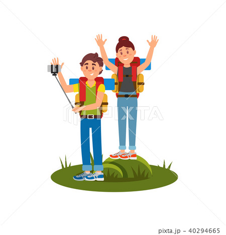 Young couple of tourists making selfie using monopod and camera. Summer hiking. Active recreation at 40294665