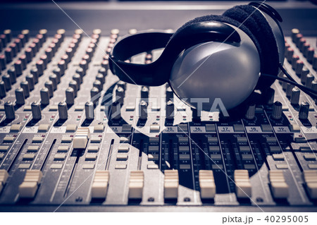 headphone on sound mixer, music background headphone on sound mixer, music background 40295005