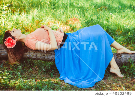 girl sleeping in nature 40302499