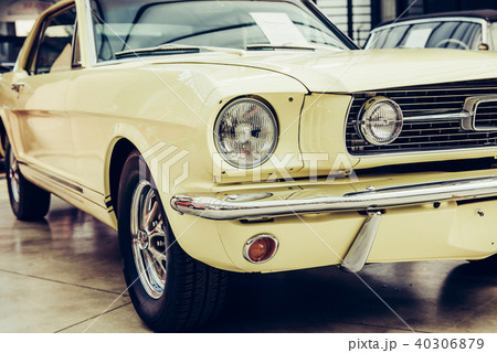 closeup of the headlights and front bumper 40306879