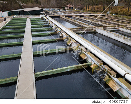 Tanks outdoors of fish farm Tanks outdoors of fish farm 40307737