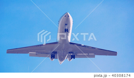 Passenger plane departing in afternoon Passenger plane departing in afternoon 40308174