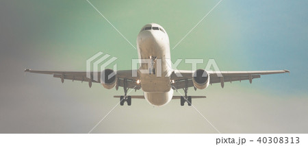 Passenger plane departing in afternoon Passenger plane departing in afternoon 40308313