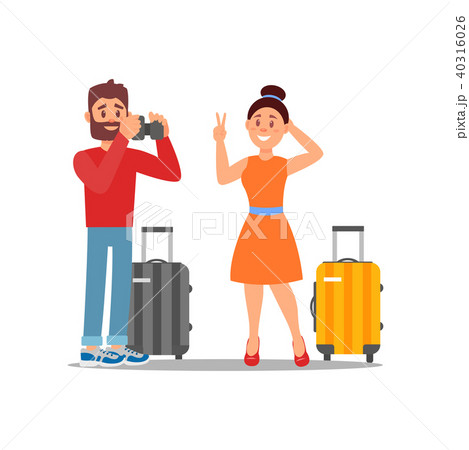 Guy taking photo of his girlfriend. Tourists with suitcases on wheels. Young couple on vacation 40316026