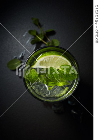 Lemonade or citrus cocktail with ice and mint overhead shot 40318131