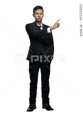 Full Body Young Asian Businessman Pointing Something Isolated Full Body Young Asian Businessman Pointing Something Isolated 40320993