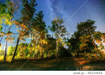 fantastic winter meteor shower and the snow-capped mountains. 40324656