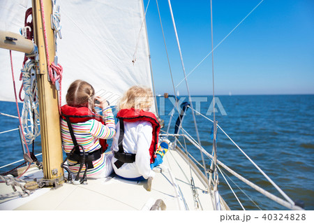 Kids sail on yacht in sea. Child sailing on boat. 40324828