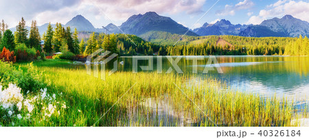 Majestic mountain lake in National Park High Tatra. Strbske ples Majestic mountain lake in National Park High Tatra. Strbske ples 40326184