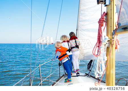 Kids sail on yacht in sea. Child sailing on boat. 40328756