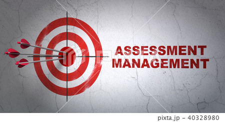 Business concept: target and Assessment Management on wall background 40328980