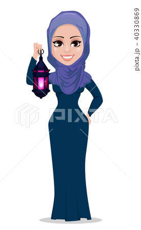 Muslim woman holding Arabic lantern Muslim woman holding Arabic lantern 40330869