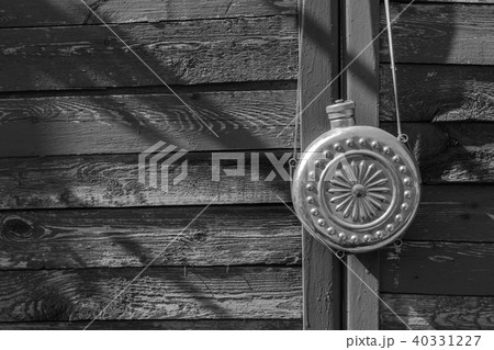 Vintage jar on the background of a wooden wall Vintage jar on the background of a wooden wall 40331227