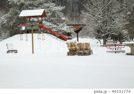 Children's Playground covered with snow  40331774