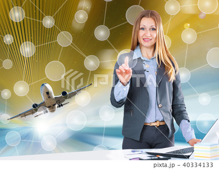 Female in suit testing digital monitor Female in suit testing digital monitor 40334133