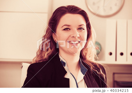 Portrait of young smiling girl in the office 40334215