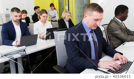Businessman working in coworking space 40336015