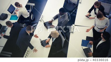 Top view of successful managers engaged in business activities Top view of successful managers engaged in business activities 40336016