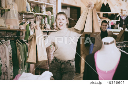 Smiling female is satisfied of purchases Smiling female is satisfied of purchases 40336605