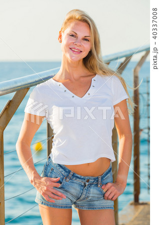 Female is posing on pirce in her free time 40337008
