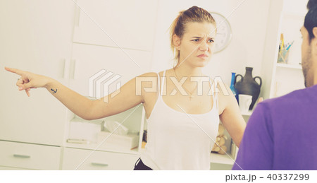 Young woman in quarrel with man 40337299