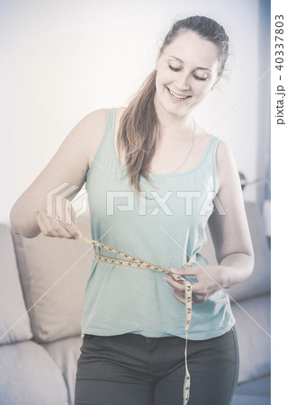 Woman happy to lose weight 40337803