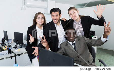 Smiling business group enjoying their success Smiling business group enjoying their success 40339786