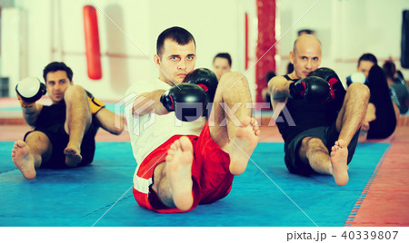 Group of people training in the boxing hall 40339807