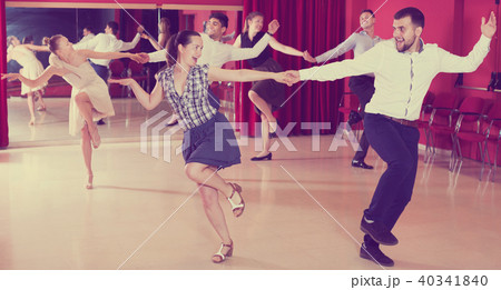 Dancing couples enjoying latin dances 40341840