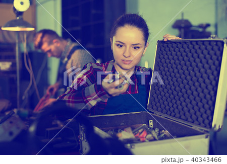female with box for instruments female with box for instruments 40343466