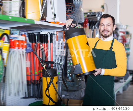 Glad guy deciding on best garden sprayer 40344150