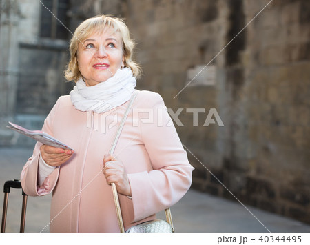 adult woman holding map guide 40344495
