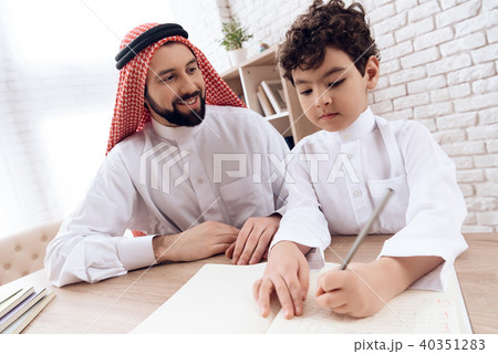 Arab father teaches little son Arab father teaches little son 40351283