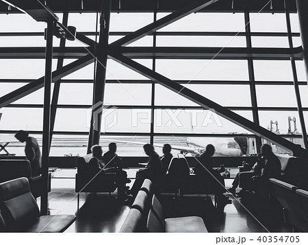 Passengers sit in airport terminal departure gate  40354705