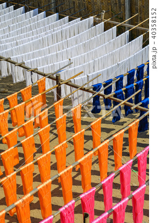 Drying fabric after traditional dye process shot 40358152