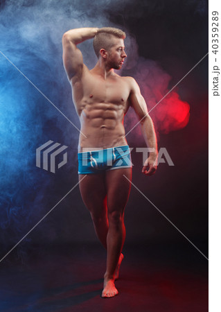 Young handsome ripped muscular man bodybuilder with perfect abs, Young handsome ripped muscular man bodybuilder with perfect abs, 40359289