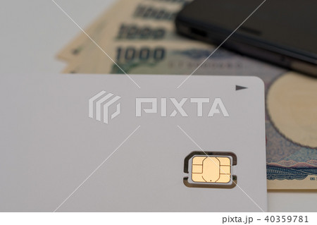 SIMカード　スマホ　千円札 40359781