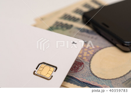SIMカード　スマホ　千円札 40359783