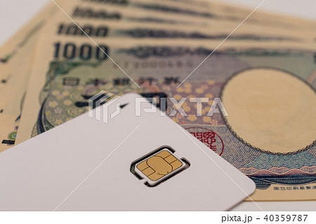 SIMカード　スマホ　千円札 40359787