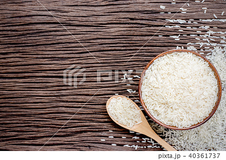 Rice bowl and spoon are placed on old wooden floor Rice bowl and spoon are placed on old wooden floor 40361737